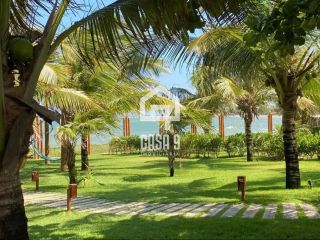 Apartamento térreo 3 suítes pé na areia a venda no condomínio Lua Nova em Itacimirim Bahia