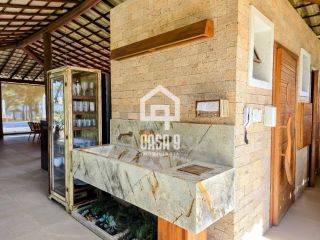 Apartamento térreo 3 suítes pé na areia a venda no condomínio Lua Nova em Itacimirim Bahia