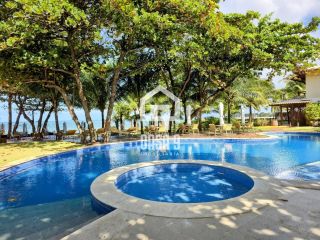 Apartamento térreo 3 suítes pé na areia a venda no condomínio Lua Nova em Itacimirim Bahia