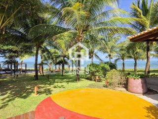 Apartamento térreo 3 suítes pé na areia a venda no condomínio Lua Nova em Itacimirim Bahia