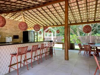 Apartamento térreo 3 suítes pé na areia a venda no condomínio Lua Nova em Itacimirim Bahia