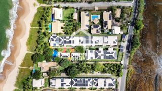 Apartamento térreo 3 suítes pé na areia a venda no condomínio Lua Nova em Itacimirim Bahia