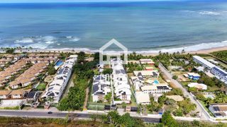 Apartamento térreo 3 suítes pé na areia a venda no condomínio Lua Nova em Itacimirim Bahia