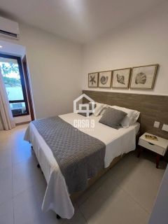 Apartamento térreo mobiliado com 3 suítes pé na areia a venda no condomínio Lua Nova em Itacimirim Bahia