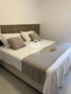 Apartamento térreo mobiliado com 3 suítes pé na areia a venda no condomínio Lua Nova em Itacimirim Bahia