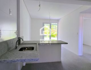 Apartamento à venda térreo 2 suítes nunca habitado em Itacimirim Bahia