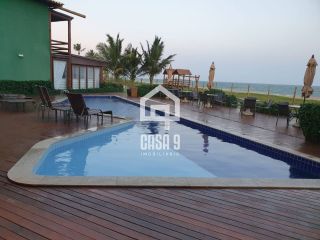 Apartamento térreo duplex 4 quartos pé na areia em Itacimirim - Bahia