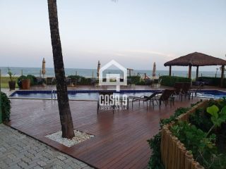 Apartamento térreo duplex 4 quartos pé na areia em Itacimirim - Bahia