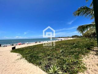Apartamento térreo pé na areia 3 suítes a venda na Praia da Espera em Itacimirim Bahia