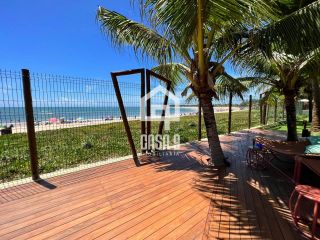 Apartamento térreo pé na areia 3 suítes a venda na Praia da Espera em Itacimirim Bahia