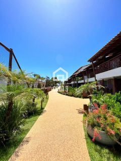 Apartamento térreo pé na areia 3 suítes a venda na Praia da Espera em Itacimirim Bahia