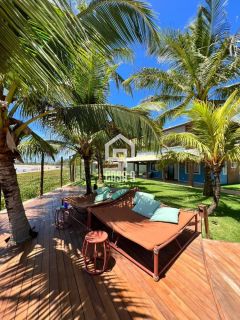 Apartamento térreo pé na areia 3 suítes a venda na Praia da Espera em Itacimirim Bahia