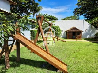 Apartamento térreo mobiliado pé na areia 3 suítes a venda no Porto Feliz em Itacimirim na Praia da Espera em Itacimirim Bahia
