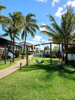 Apartamento térreo mobiliado pé na areia 3 suítes a venda no Porto Feliz em Itacimirim na Praia da Espera em Itacimirim Bahia