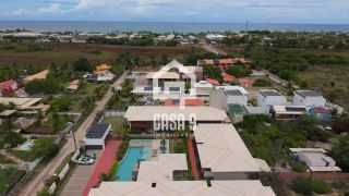 Apartamento novo térreo nascente mobiliado com varanda a venda com 2 suítes em Itacimirim Bahia