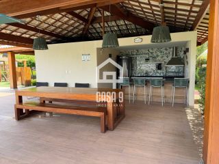 Apartamento novo térreo nascente mobiliado com varanda a venda com 2 suítes em Itacimirim Bahia