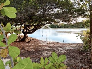 Terreno plano com 800 m² a venda fundo de lagoa no condomínio Águas de Sauipe em Porto de Sauipe Bahia