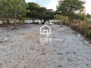 Terreno plano com 800 m² a venda fundo de lagoa no condomínio Águas de Sauipe em Porto de Sauipe Bahia