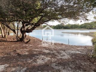 Terreno plano com 800 m² a venda fundo de lagoa no condomínio Águas de Sauipe em Porto de Sauipe Bahia