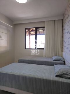 Apartamento mobiliado a venda com 2 suítes pé na areia em Itacimirim Bahia