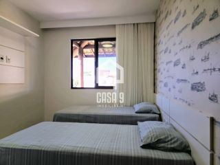 Apartamento mobiliado a venda com 2 suítes pé na areia em Itacimirim Bahia