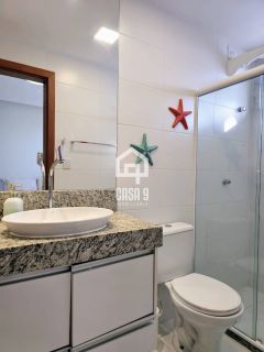 Apartamento mobiliado a venda com 2 suítes pé na areia em Itacimirim Bahia