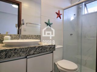 Apartamento mobiliado a venda com 2 suítes pé na areia em Itacimirim Bahia