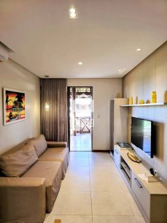 Apartamento mobiliado a venda com 2 suítes pé na areia em Itacimirim Bahia