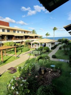 Apartamento mobiliado a venda com 2 suítes pé na areia em Itacimirim Bahia