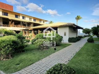 Apartamento mobiliado a venda com 2 suítes pé na areia em Itacimirim Bahia