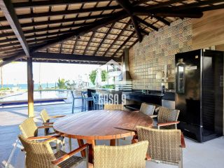 Apartamento mobiliado a venda com 2 suítes pé na areia em Itacimirim Bahia