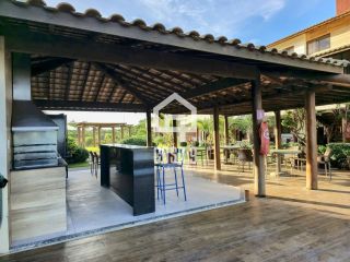 Apartamento mobiliado a venda com 2 suítes pé na areia em Itacimirim Bahia