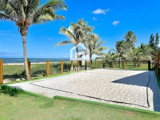 Apartamento novo pé na areia com 3 suítes a venda em Itacimirim Bahia