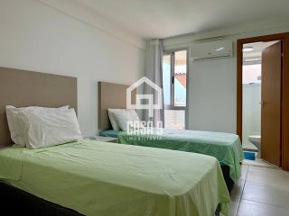 Apartamento pé na areia com 3 suítes mobiliado a venda em Itacimirim Bahia