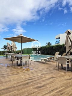 Apartamento pé na areia com 3 suítes mobiliado a venda em Itacimirim Bahia