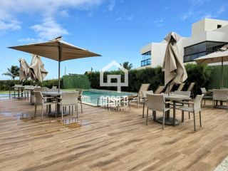 Apartamento pé na areia com 3 suítes mobiliado a venda em Itacimirim Bahia