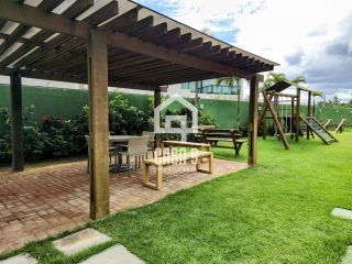 Apartamento pé na areia com 3 suítes mobiliado a venda em Itacimirim Bahia