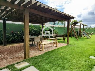 Apartamento pé na areia com 3 suítes mobiliado a venda em Itacimirim Bahia