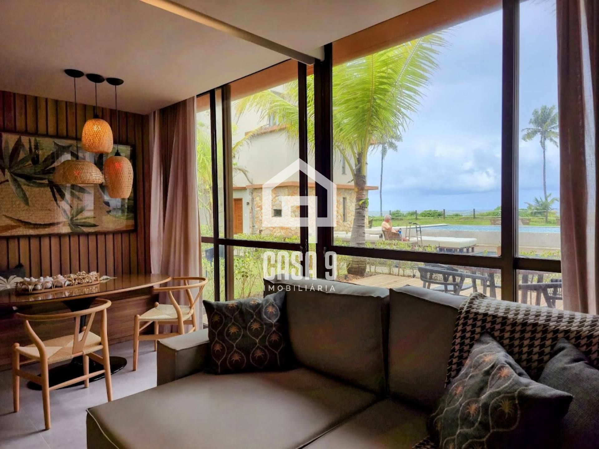 Apartamento térreo duplex mobiliado frente mar com 2 suites no Alphaville Guarajuba Bahia