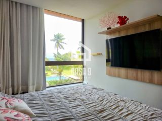 Apartamento térreo duplex mobiliado frente mar com 2 suites no Alphaville Guarajuba Bahia