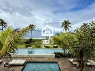 Apartamento térreo duplex mobiliado frente mar com 2 suites no Alphaville Guarajuba Bahia