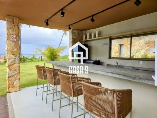 Apartamento térreo duplex mobiliado frente mar com 2 suites no Alphaville Guarajuba Bahia