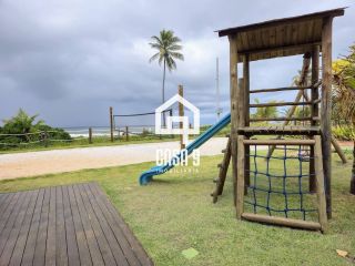 Apartamento térreo duplex mobiliado frente mar com 2 suites no Alphaville Guarajuba Bahia