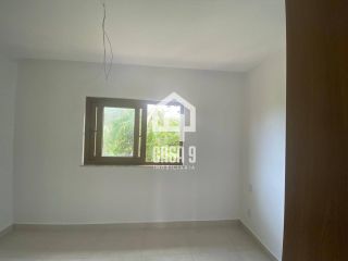 Apartamento duplex tipo village com 2 suítes novo a venda em Imbassai Bahia