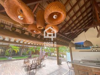 Apartamento duplex tipo village com 2 suítes novo a venda em Imbassai Bahia