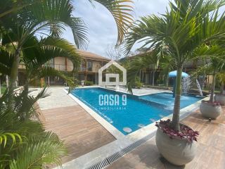 Apartamento duplex tipo village com 2 suítes novo a venda em Imbassai Bahia