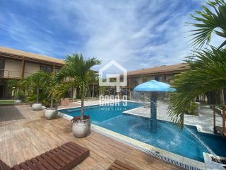 Apartamento duplex tipo village com 2 suítes novo a venda em Imbassai Bahia