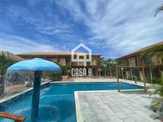 Apartamento duplex tipo village com 2 suítes novo a venda em Imbassai Bahia