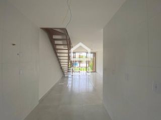 Apartamento duplex tipo village com 2 suítes novo a venda em Imbassai Bahia