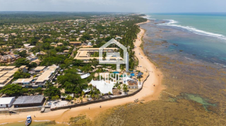 Apartamento a venda com 1 quarto no condomínio Kauai, frente mar e na Vila de Praia do Forte Bahia